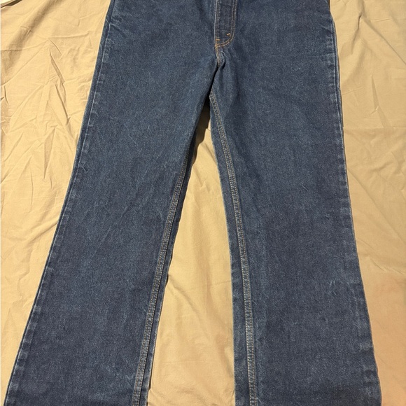 orange tag levi’s dark wash